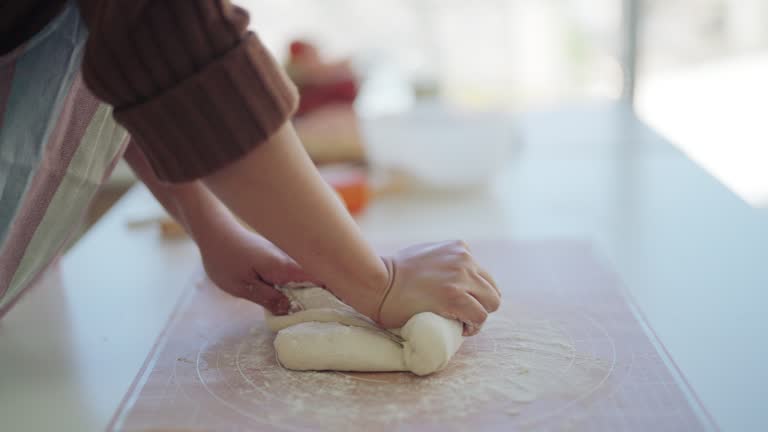 Making a Loaf of Bread by Kneading it with Your Hands