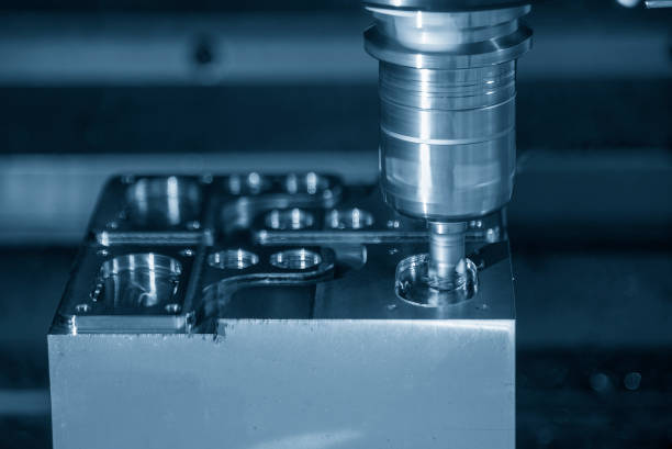 istock The CNC milling machine cutting injection mold part by bull nose end mill tool. 1603296610