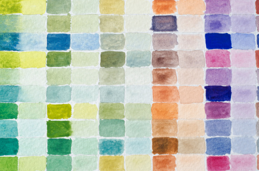 A filled grid of watercolour paint shades comparing full strength of colour to it's diluted equivalent in adjacent columns.