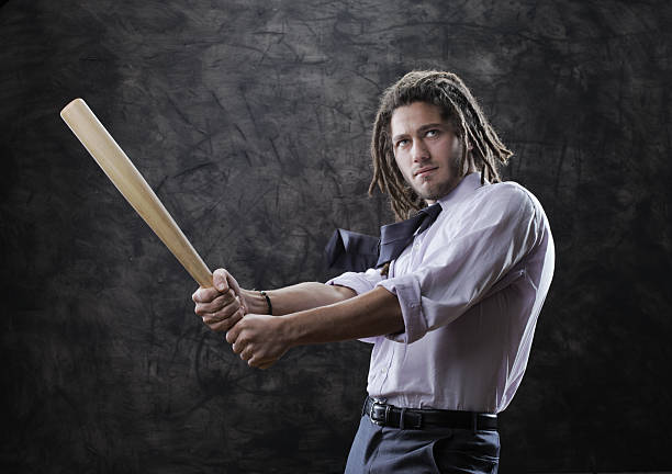 istock Businessman swinging baseball bat 160329924