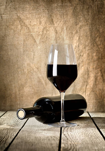 istock Black bottle of wine and wneglass 160330323