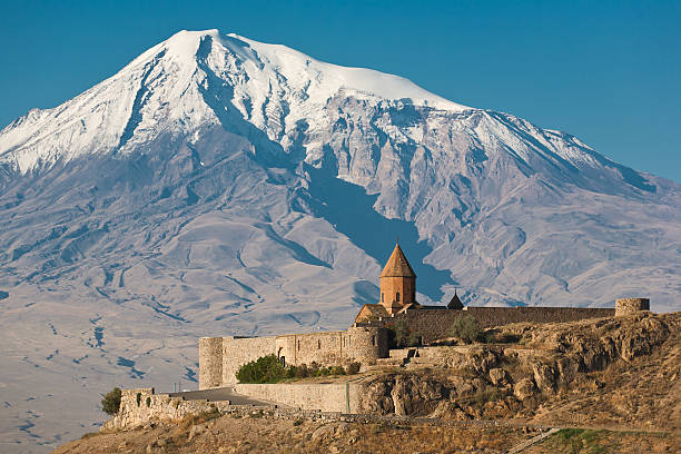 istock Ancient Armenian church with a mountain behind it 160330564