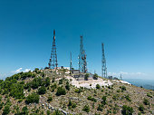 TV and mobile communications towers on top of the mountain, aerial view