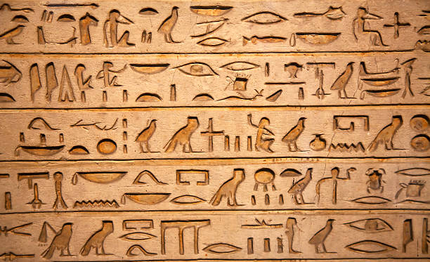 istock hieroglyphs carved on the stone 160330817