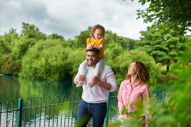 istock young family in the park 1603311723