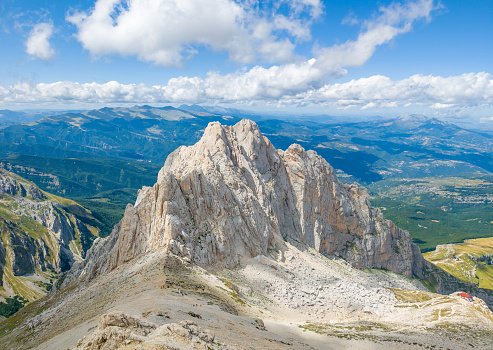 Gran Sasso, Italy - 6 August 2023 - The alpinistic way to Vetta Occidentale of Corno Grande, 2912 meters in Abruzzo region, named Via delle Creste of Cresta Ovest. Here in particular a view of Corno Piccolo