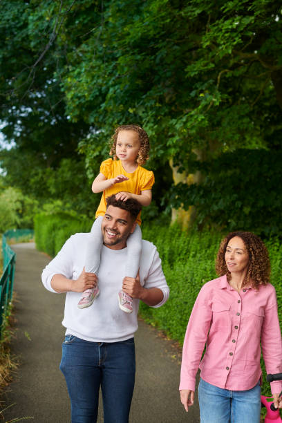 istock young family in the park 1603316729