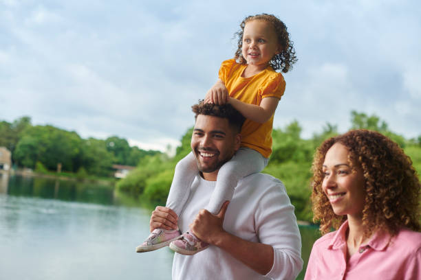 istock young family in the park 1603318330