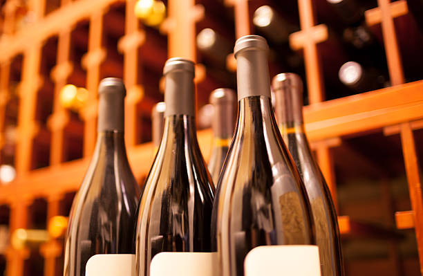 istock Sealed glass wine bottles in wine cellar 160333342