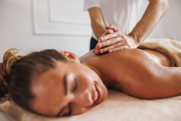 istock Woman Enjoying Massage In Spa Centre 1603336133