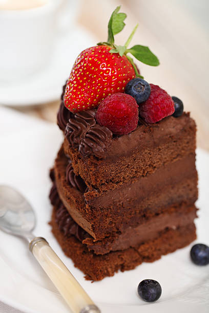 istock Piece of chocolate cake with icing and fresh berry 160333644