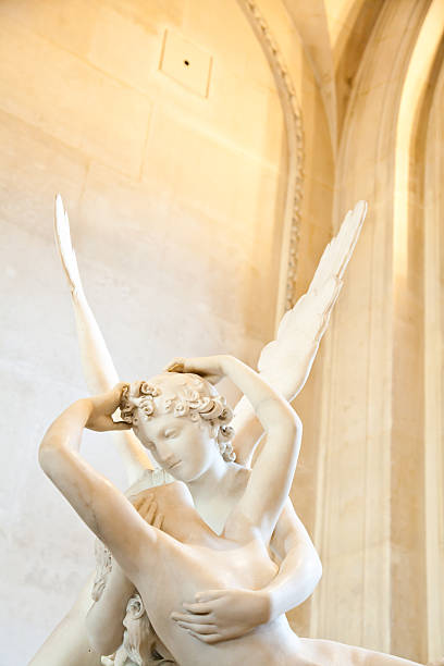 Psyche revived by Cupid kiss Antonio Canova's statue Psyche Revived by Cupid's Kiss, first commissioned in 1787, exemplifies the Neoclassical devotion to love and emotion psyche stock pictures, royalty-free photos & images