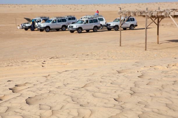 istock Off-road car at rest in Sahara desert 160333928