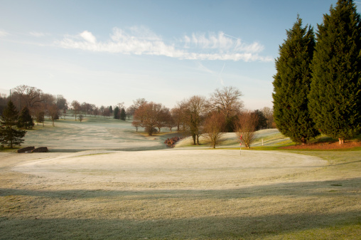 A golf course drapped in winter frost in the UK.