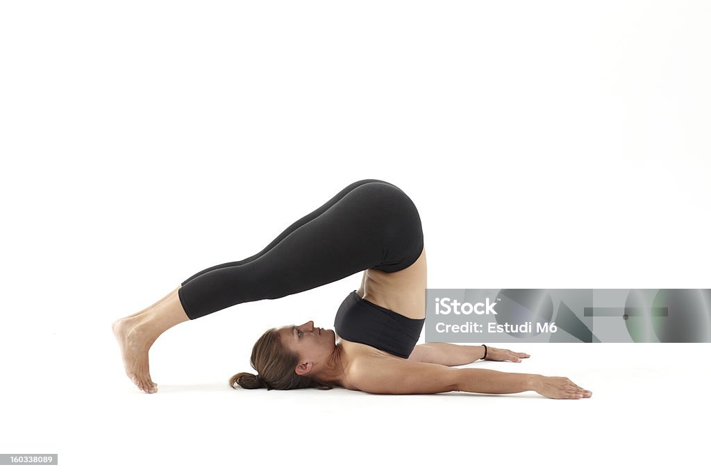 Mujer practicar pilates - Foto de stock de Actividades y técnicas de relajación libre de derechos