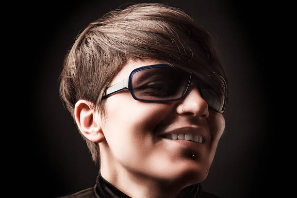 Woman With Sunglasses . Studio Shot stock photo