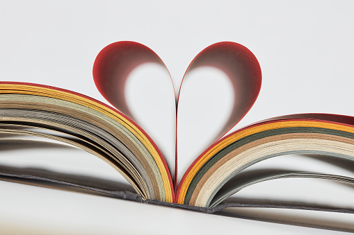 Heart book page. Heart a from book pages. Shallow depth of field