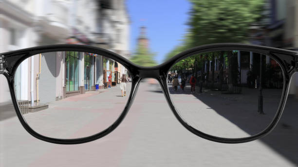 sharpness with glasses walking around the city stock photo