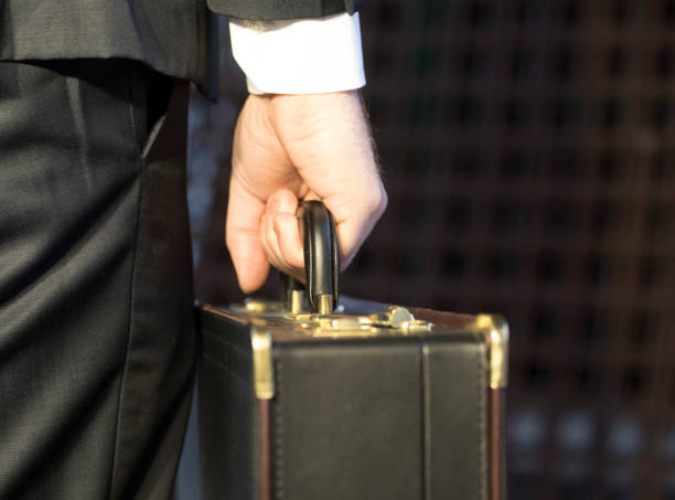 istock person in suit with briefcase 1603405874