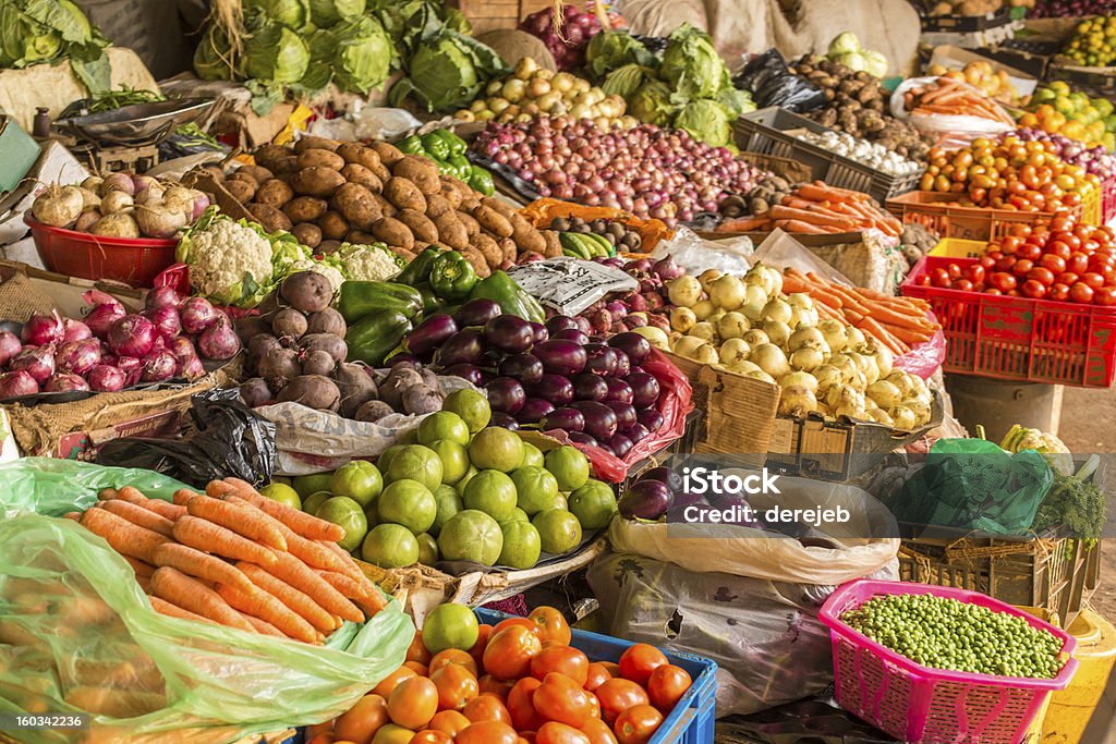 Fruit and Vegetable Market Colorful fruits and vegetables colorfully arranged at a local fruit and vegetable market in Nairobi, Kenya. Market - Retail Space Stock Photo