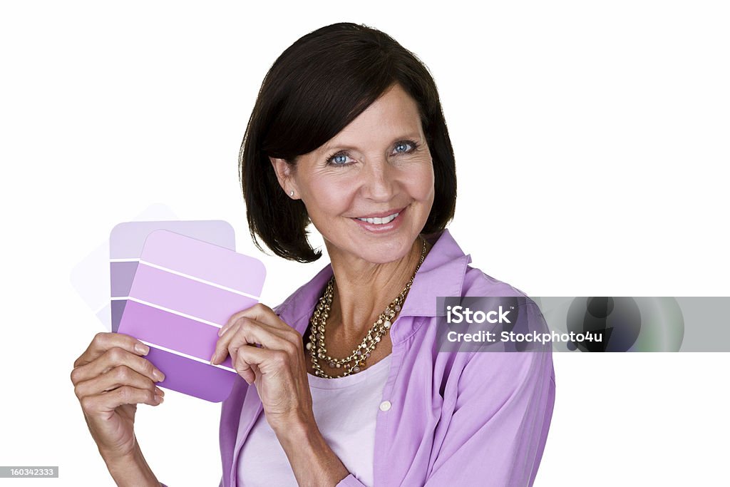 Donna matura con carte di colore - Foto stock royalty-free di 50-54 anni