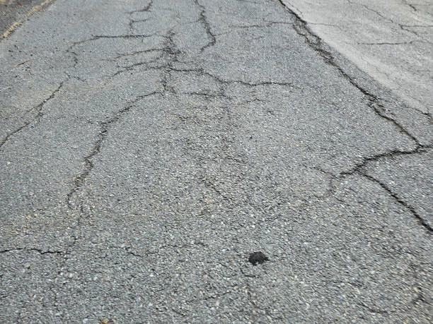 istock Cracked Street Cement 1603440829
