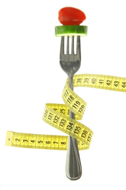 istock Healthy diet, vegetable on a fork isolated on white transparent background 1603442507
