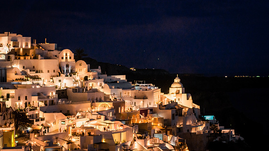 lights of Santorini town at night.