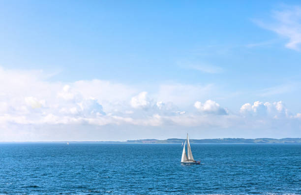 istock Sailbot at sea on a sunny day. 1603456065