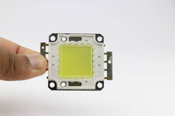 istock High power ultra bright white LED panel held in the hand 1603469369