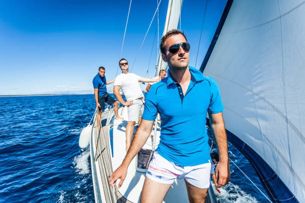 istock Caucasian man posing on the sailboat 160347411