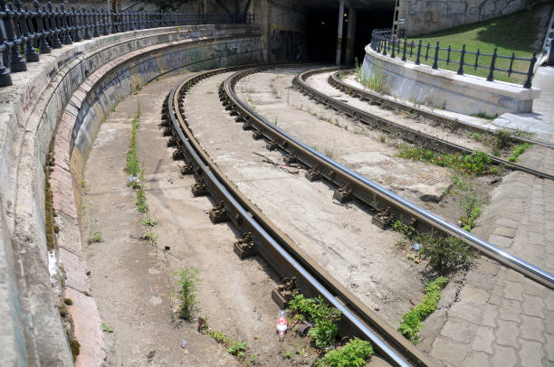 Tram tracks in Budapest disappear into a tunnel under Castle Hill.