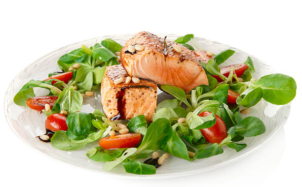 istock Rare fried salmon steaks isolated on white 160349769