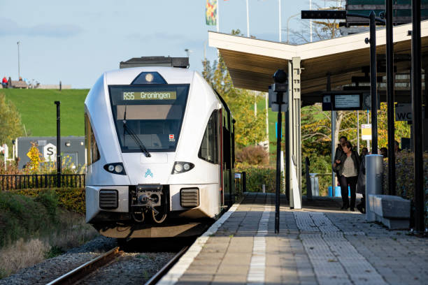 Arriva train DELFZIJL, THE NETHERLANDS - OCTOBER 19, 2022: Arriva Stadler GTW regional train at Delfzijl railway station arriva stock pictures, royalty-free photos & images