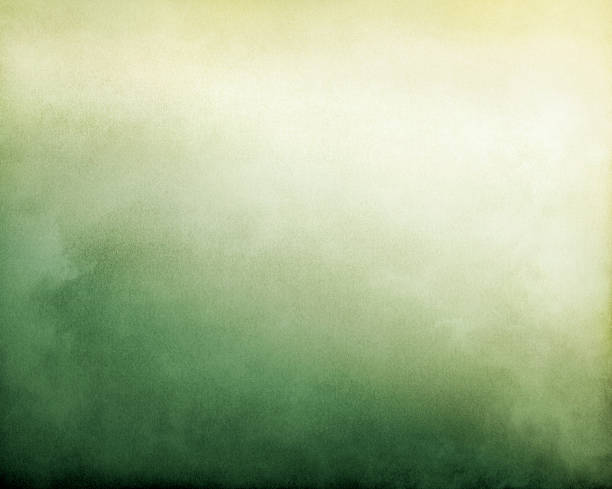 Yellow Green Fog Fog and clouds on a green to yellow textured gradient background.  Image displays a pleasing paper grain and texture at 100%. strong grain stock pictures, royalty-free photos & images