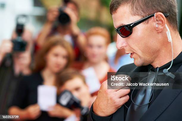 Its Chaos Out Here Celebrity Lifestyle Stock Photo - Download Image Now - Security Guard, Security Staff, Hands-free Device
