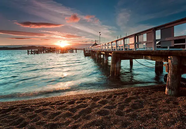 View of the sunset from jetty at Russell, Bay of Islands, New Zealand,