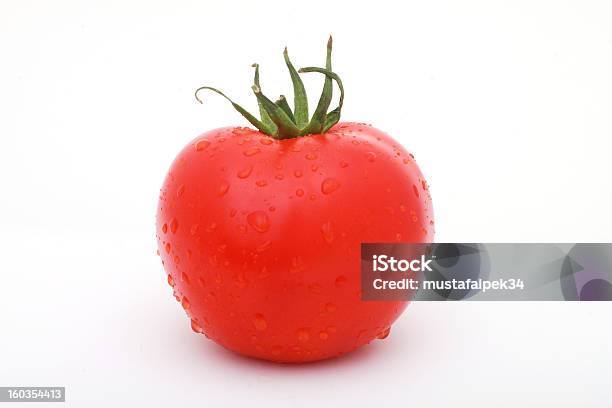 Tomate Foto de stock y más banco de imágenes de Alimento - Alimento, Brillante, Color - Tipo de imagen