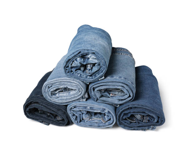 istock Different stylish rolled jeans isolated on white 1603550633