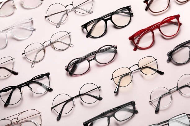istock Many different stylish glasses on light grey background, flat lay 1603552258