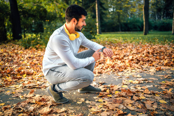 istock Man checks data on a fitness tracker 1603561056