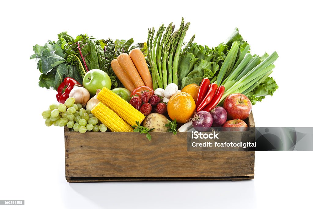 Fruits and veggies in wood box with white backdrop - Royalty-free Groente Stockfoto