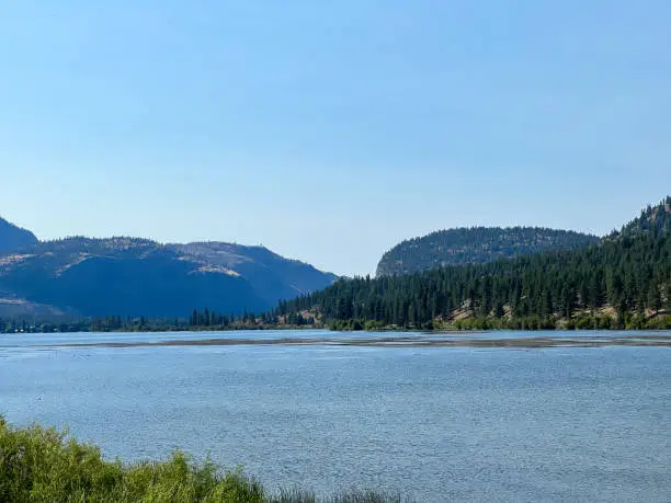 Vaseux Lake, situated along the course of the Okanagan River, between Oliver and Okanagan Falls, Okanagan Valley, British-Columbia, Canada, view on the McIntyre Bluff and mountain in the background, summer day