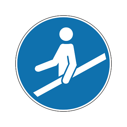 Railing sign. Mandatory sign. Round blue sign. Use railings for safety. Caution, stairs, escalators and moving walkways. Follow the safety rules