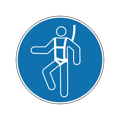 Sign of safety equipment at height. Mandatory sign. Round blue sign. Tie down belts. Work at height only with climbing equipment. Follow safety rules at height. Seat belts