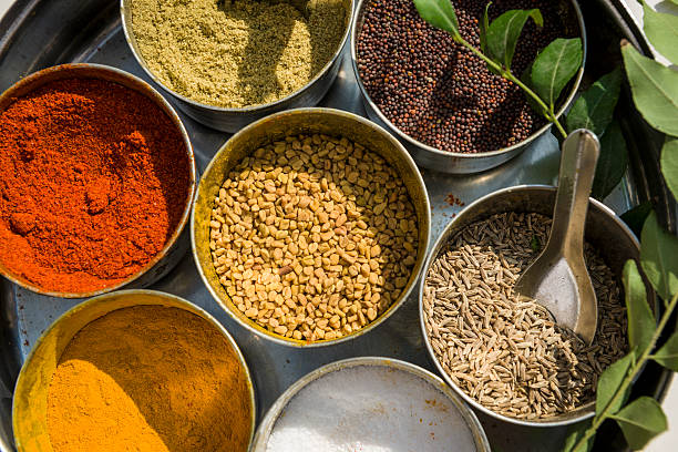 istock Various indian spices in metal bowls on try 160363432