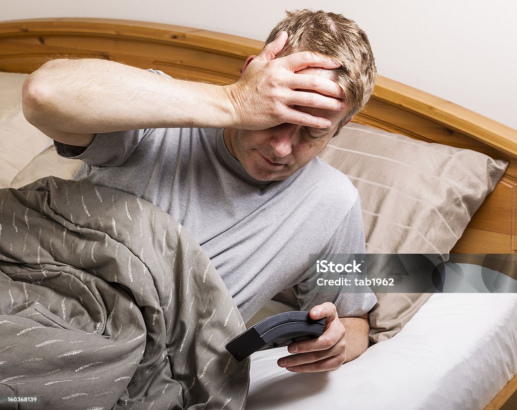 Too Early for Work Mature man waking up for routine daily job Adult Stock Photo