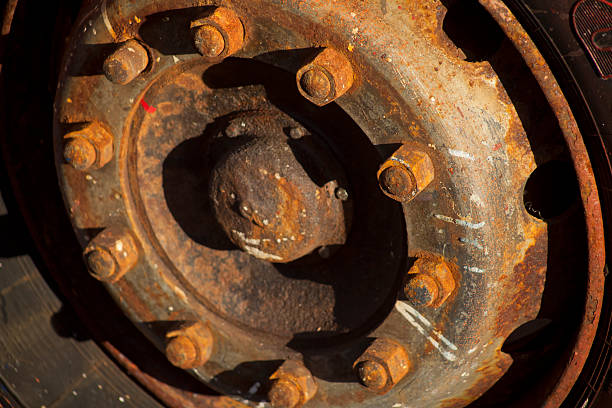 Rusty wheel rim. Big wheel in heavy industry with rusty rim tornillo stock pictures, royalty-free photos & images