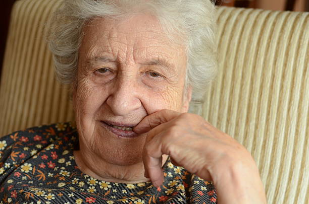 istock senior woman thinking 160369419