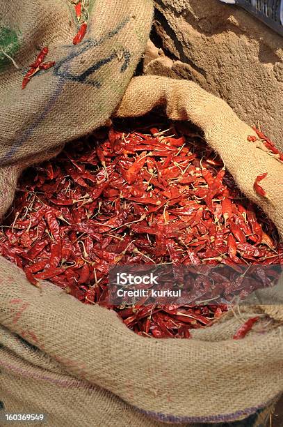 Foto de Sacos De Chillis e mais fotos de stock de Luz solar - Luz solar, Seco, Agricultura